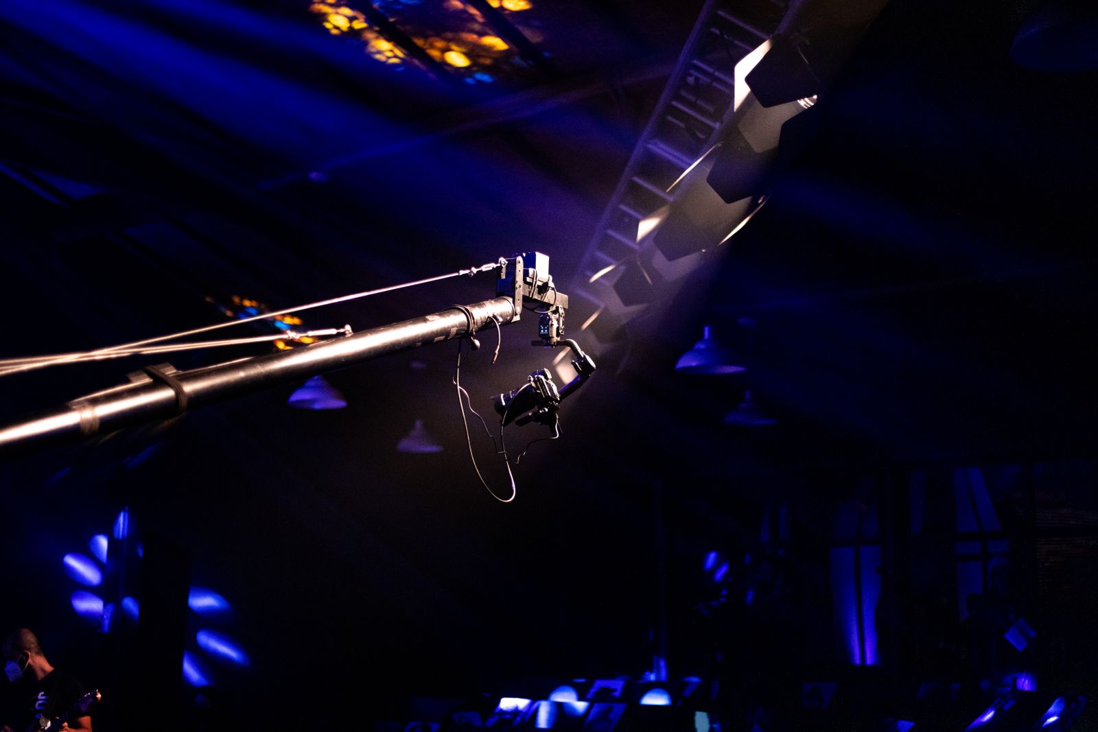 Lighting rig installed above a live performance
